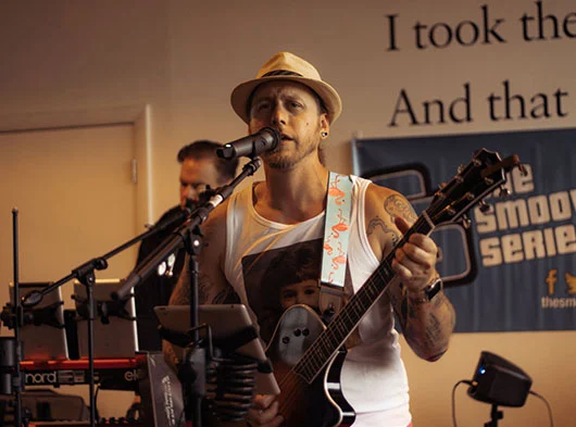 Close up of Mike Angeli of Smoove Series singing at Two Roads Brewing in Stratford, CT