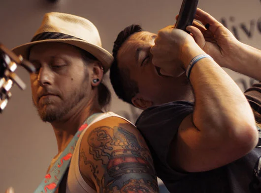 Close up of Mike Angeli & Joe Scovill back to back playing at Two Roads Brewing in Stratford, CT