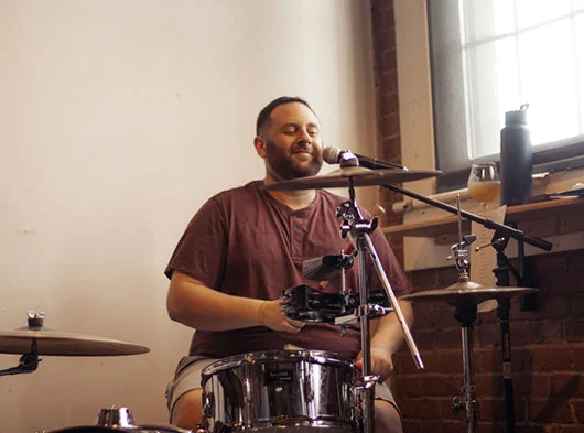 Joe Saad of Smoove Series playing drums at Two Roads Brewing in Stratford, CT