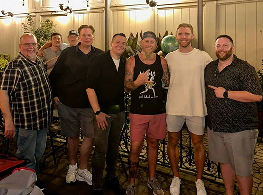 Smoove Series taking photo with a professional hockey player after a show in Darien, CT