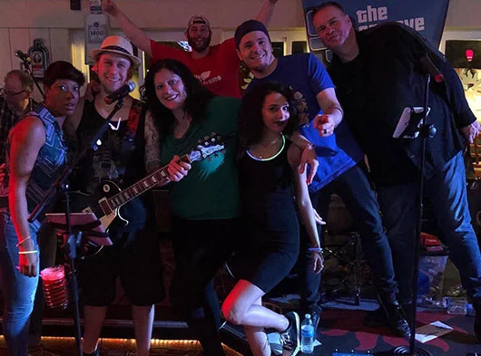 Smoove Series posing with a bunch of fans after show at Zen Bar in Plainville, CT