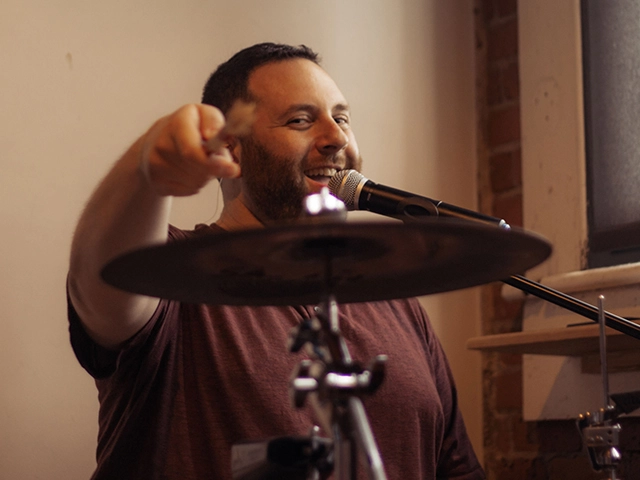 Joe Saad playing at a brewery